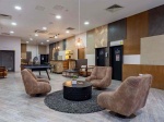 pacious communal lounge area with comfortable seating and social spaces.