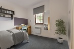 en-suite student accommodation Don Street residence hall. Includes bed, desk, chair, storage