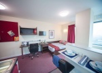 Compact studio with integrated amenities, St George's Tower.