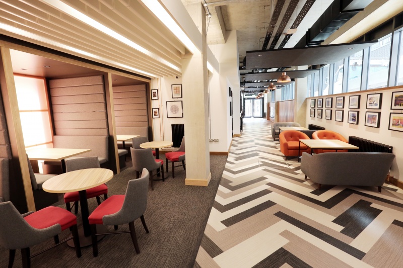 Quiet study spaces with desks and chairs at Oxford House student accommodation