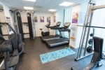 Fully equipped gym with exercise machines at Oxford House student accommodation