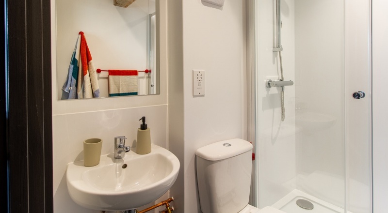 Well-lit bathroom at Béton House student accommodation in Sheffield