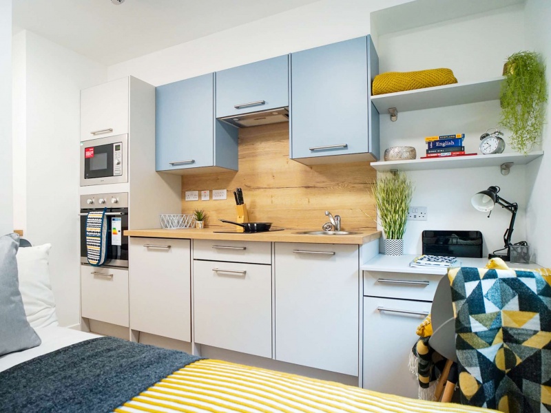 Contemporary student kitchen in Goods Corner, Edinburgh, showing sleek cabinets, integrated applianc