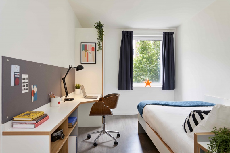 Bronze En-suite study desk, bed, and modern decor at ASA Briggs House