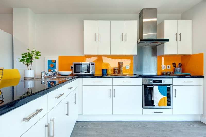 Fully equipped cluster kitchen at Central Living Exeter, ideal for shared living