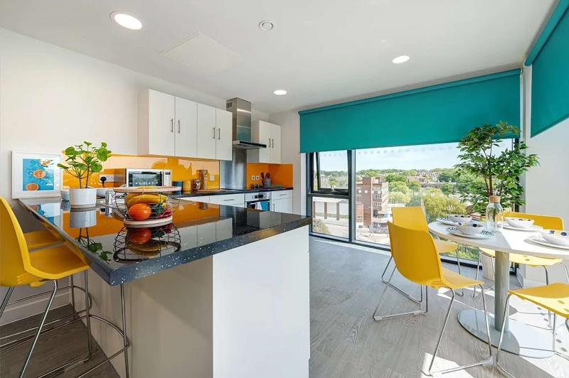 Fully equipped cluster kitchen at Central Living Exeter, ideal for shared living