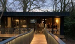 Evening event at Beech Gardens communal area, showcasing students socializing inside the modern buil