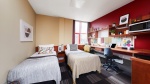 Modern student twin studio at Burges House Coventry. Includes beds, desk, chair, storage and has a w
