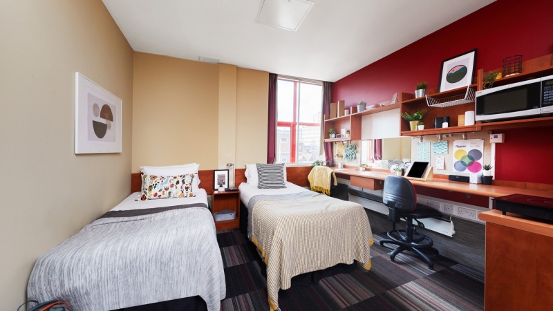Modern student twin studio at Burges House Coventry. Includes beds, desk, chair, storage and has a w