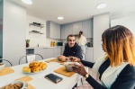 Shared kitchen area AT Pennine House, Fully equipped with modern appliances and a dining table