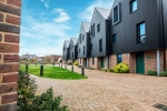 The exterior of Elmstead Place student accommodation, showing the building and landscaped surroundin