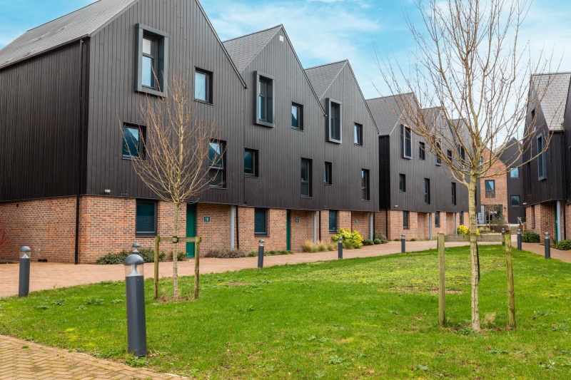 The exterior of Elmstead Place student accommodation, showing the building and landscaped surroundin