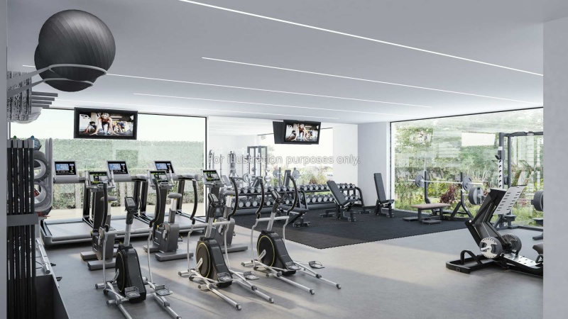 On-site gym at Aire student accommodation with various exercise machines and free weights