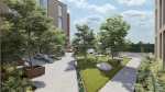 Landscaped outdoor area at Aire student accommodation with seating and greenery.