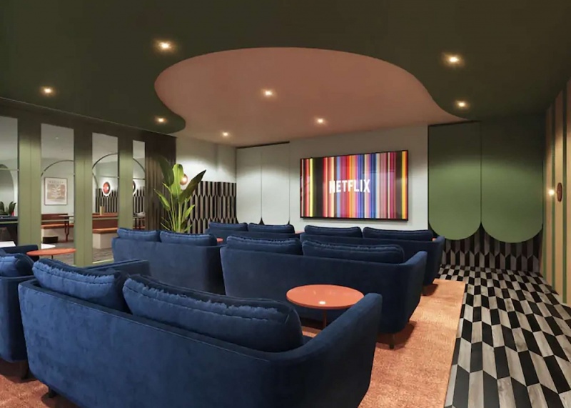 Cozy TV room at The Edge, furnished with comfortable seating for movie nights and relaxation