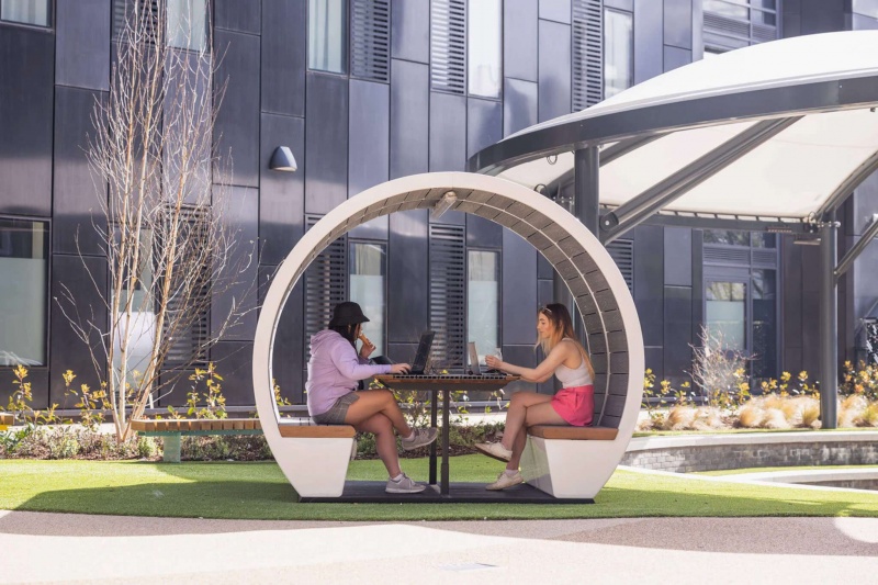 Students using outdoor seating pod at Onyx Birmingham