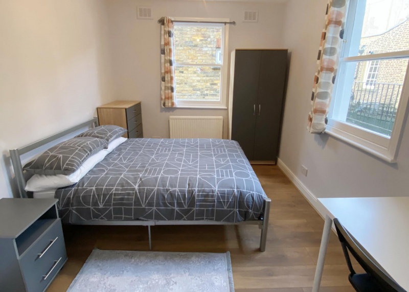 bedroom with study desk and chair at Raleigh House student accommodation, London