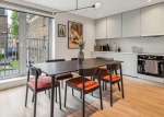 Community Kitchen Dining Room at the residentia apartments The Apiary