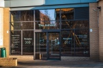 Front Entrance: The Junxion front entrance with glass doors and reception signage.