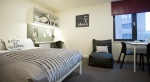 Comfortable bedroom at Powis Place, Aberdeen with a large bed, study area, and modern design