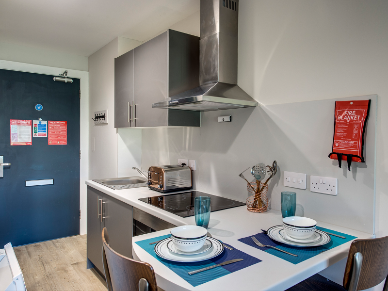 Share kitchen at two-Bed Apartment , desk, and storage at Riverside Quay